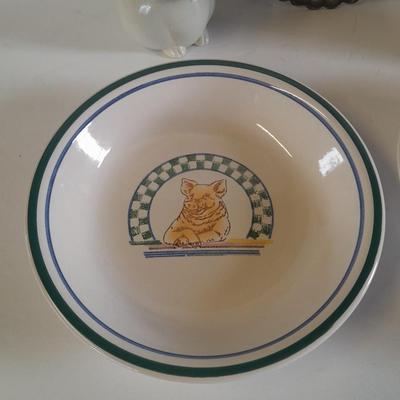 Pig Kitchen items metal trivet, soap dispenser, bowls, and pig figure