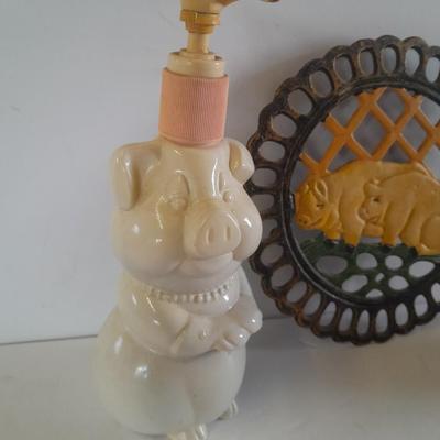 Pig Kitchen items metal trivet, soap dispenser, bowls, and pig figure