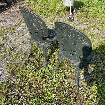 890 Pair of Cast Iron Chairs