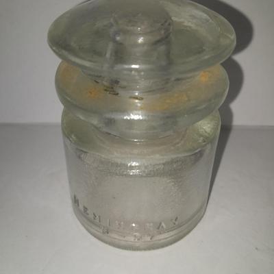 Four clear glass Hemingray Insulators