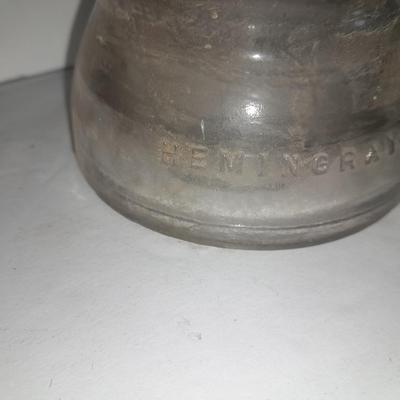 Four clear glass Hemingray Insulators