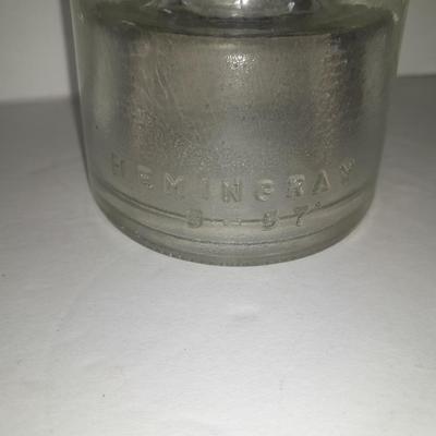 Four clear glass Hemingray Insulators