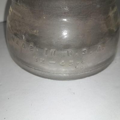 Four clear glass Hemingray Insulators