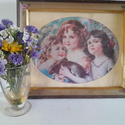 Vintage painted frame with "The Three Graces" by Emile Vernon and a bouquet of faux flowers in a vase