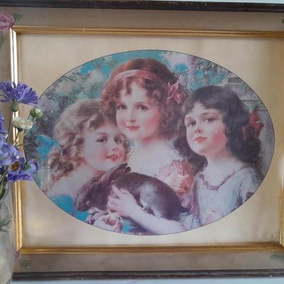 Vintage painted frame with "The Three Graces" by Emile Vernon and a bouquet of faux flowers in a vase