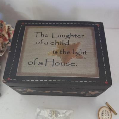 Two collectible dolls with stands, small wooden decorative box and some jewelry