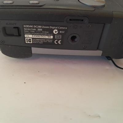Two 35mm camera's Kodak digital display and Canon Snappy Q