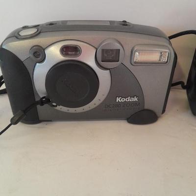 Two 35mm camera's Kodak digital display and Canon Snappy Q