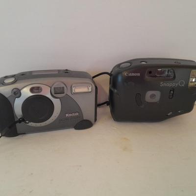 Two 35mm camera's Kodak digital display and Canon Snappy Q