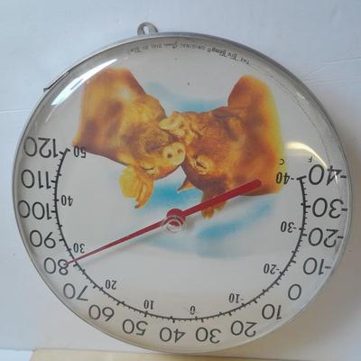 The Tru Temp thermometer with pigs and a 1966 DCC PUBL. CO. Pig print