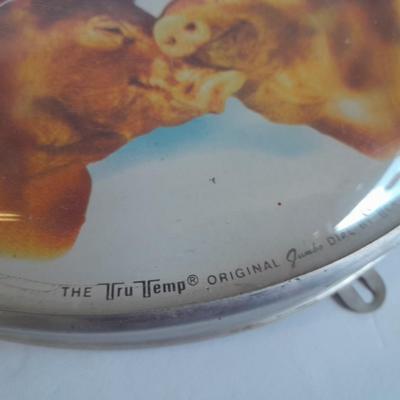 The Tru Temp thermometer with pigs and a 1966 DCC PUBL. CO. Pig print
