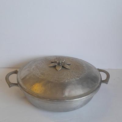 Beautiful, hammered Aluminum covered dish with divided glass insert.
