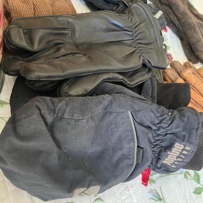 Various Gloves and Tin