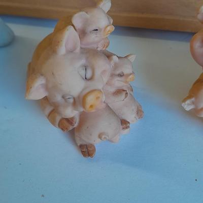 Framed pig wall art with pig figures