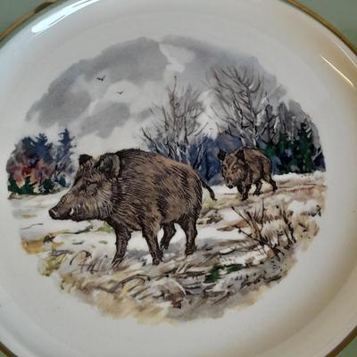 Two Classic Heritage Green collector's plates, Elk and Boar with framed wall art