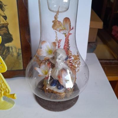 Two vintage Jesus wall hangings, metal Owl earring holder, and other decorative items