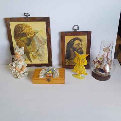 Two vintage Jesus wall hangings, metal Owl earring holder, and other decorative items