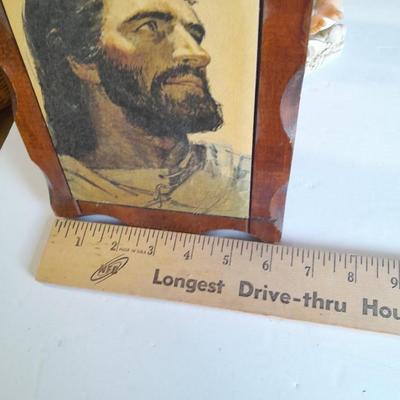 Two vintage Jesus wall hangings, metal Owl earring holder, and other decorative items