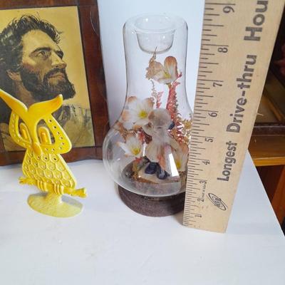 Two vintage Jesus wall hangings, metal Owl earring holder, and other decorative items