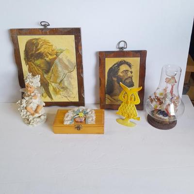 Two vintage Jesus wall hangings, metal Owl earring holder, and other decorative items