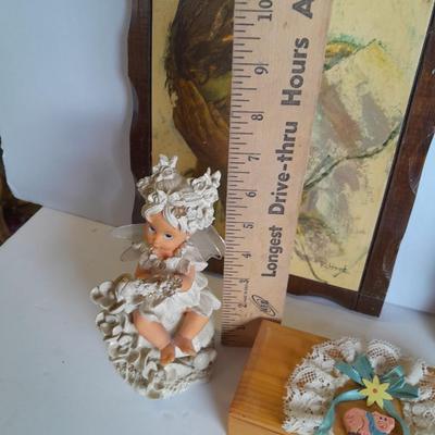 Two vintage Jesus wall hangings, metal Owl earring holder, and other decorative items