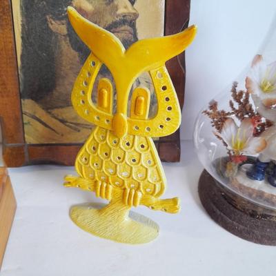 Two vintage Jesus wall hangings, metal Owl earring holder, and other decorative items
