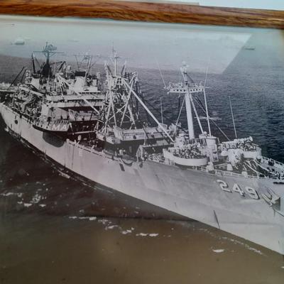 U.S.A. Navy clock and mug with sticker and black and white photograph of a ship