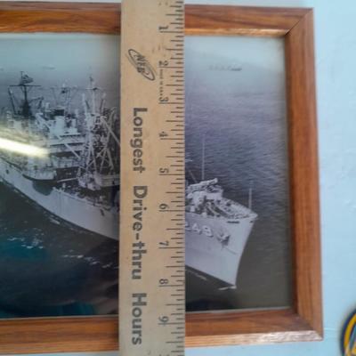 U.S.A. Navy clock and mug with sticker and black and white photograph of a ship