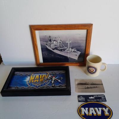 U.S.A. Navy clock and mug with sticker and black and white photograph of a ship
