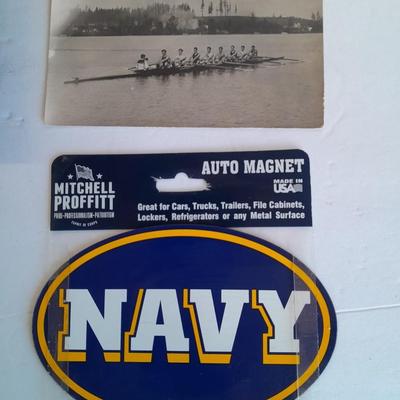 U.S.A. Navy clock and mug with sticker and black and white photograph of a ship