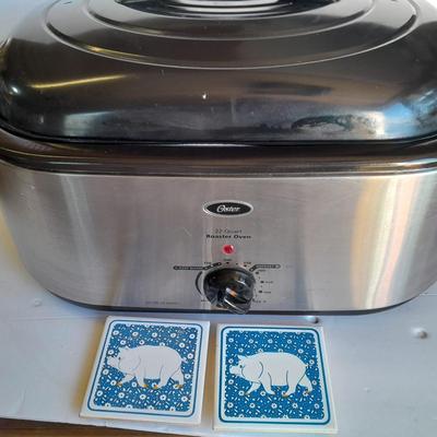 Oster 22 -Quart Electric Roaster Oven with small tile Pig Trivets