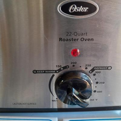 Oster 22 -Quart Electric Roaster Oven with small tile Pig Trivets