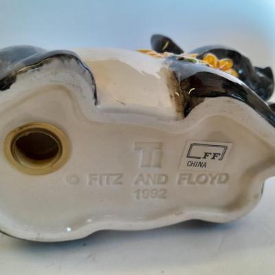 Two piggy banks with a Fits and Floyd sunflower potpourri pig