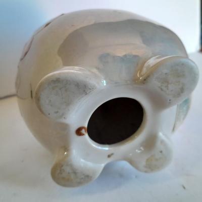 Two piggy banks with a Fits and Floyd sunflower potpourri pig