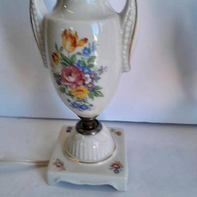Two floral patterned porcelain lamps with shades