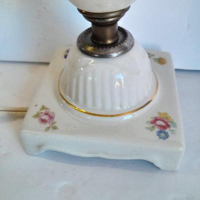 Two floral patterned porcelain lamps with shades