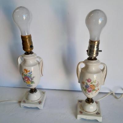 Two floral patterned porcelain lamps with shades