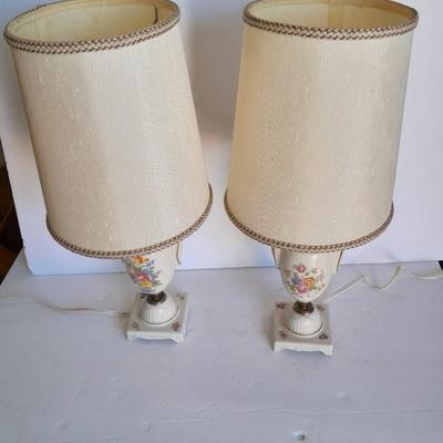 Two floral patterned porcelain lamps with shades