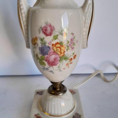 Two floral patterned porcelain lamps with shades