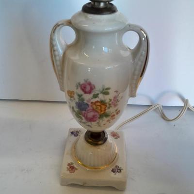 Two floral patterned porcelain lamps with shades