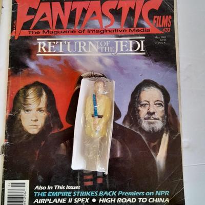 Star Wars collectibles, Nintendo game storybook, 45 LP record, figure, and comics