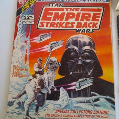 Star Wars collectibles, Nintendo game storybook, 45 LP record, figure, and comics