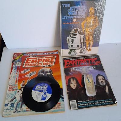 Star Wars collectibles, Nintendo game storybook, 45 LP record, figure, and comics