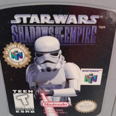 Star Wars collectibles, Nintendo game storybook, 45 LP record, figure, and comics