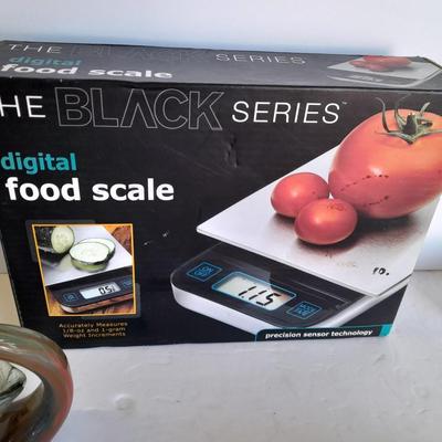 The Black series digital food scale with vintage kitchenware