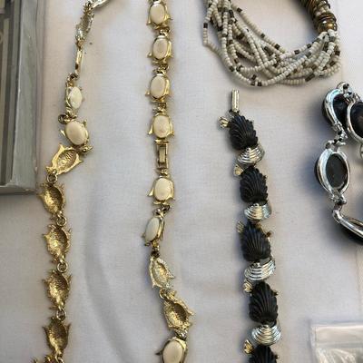 Fossil watch, necklace, bracelet, and earring sets