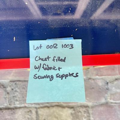 Chest filled with sewing supplies