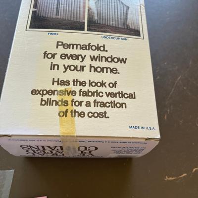 2 Boxes of white Verticle curtains