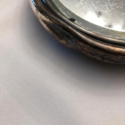 Three hand mirrors