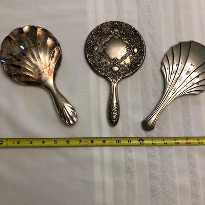 Three hand mirrors